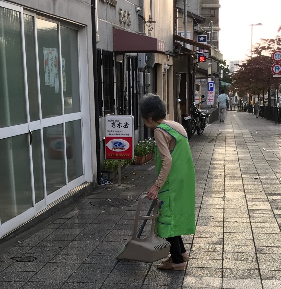 faces woman shop streetcleaner in morning kyoto blog