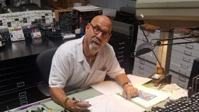 neal at desk2…